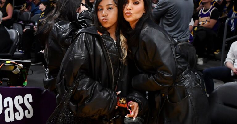 Kim Kardashian and North Match in black leather looks at the Lakers game