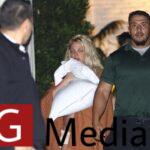 Britney Spears leaves with friends after an ambulance is called to the hotel
