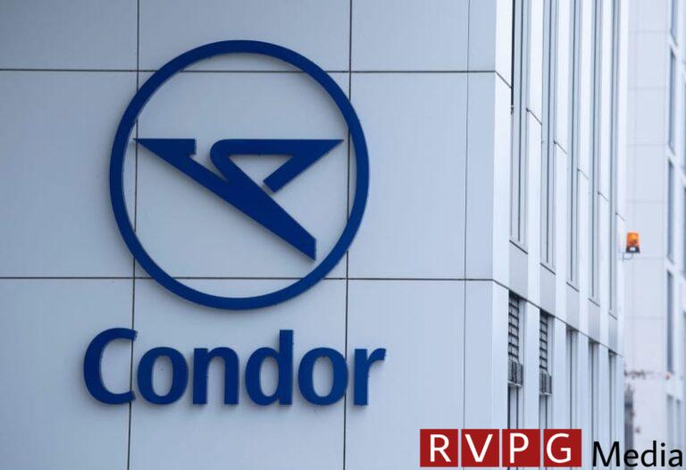 The Condor logo on an airline building at the airport. Boris Roessler/dpa