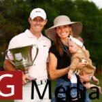 Rory McIlroy of Northern Ireland celebrates with the trophy alongside his wife Erica and daughter Poppy after winning during the final round of the 2021 Wells Fargo Championship at Quail Hollow Club on May 09, 2021 in Charlotte, North Carolina.