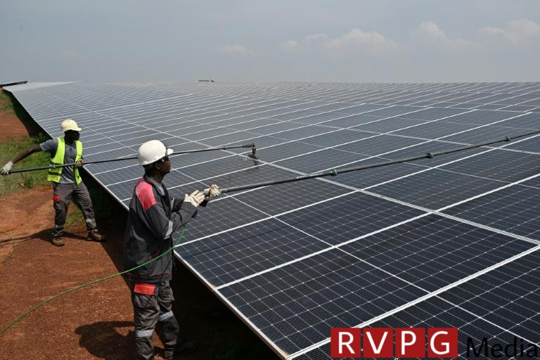 Solar panel costs have decreased by 30 percent over the past two years, the IEA said (Sia KAMBOU)